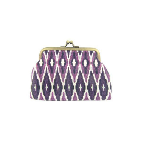 Mlavi bohemian style Ikat print vegan kiss lock frame coin purse made with Eco-friendly & cruelty free vegan materials. Great for everyday use & wonderful as a gift to family & friends. Wholesale at www.mlavi.com for gift shops, fashion accessories & clothing boutiques, museum stores worldwide.