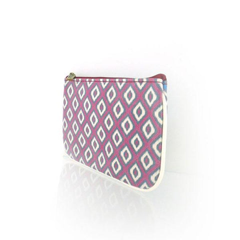 Mlavi Ikat pattern print small pouch/coin purse made with Eco-friendly & cruelty free vegan materials. Great for everyday use & wonderful as a gift to family & friends. Wholesale at www.mlavi.com for gift shops, fashion accessories & clothing boutiques, museum stores worldwide.