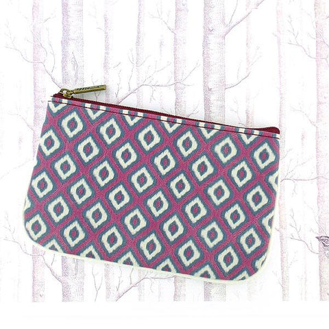 Mlavi Ikat pattern print small pouch/coin purse made with Eco-friendly & cruelty free vegan materials. Great for everyday use & wonderful as a gift to family & friends. Wholesale at www.mlavi.com for gift shops, fashion accessories & clothing boutiques, museum stores worldwide.