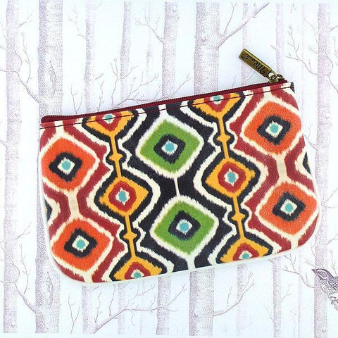 Mlavi Ikat pattern print small pouch/coin purse made with Eco-friendly & cruelty free vegan materials. Great for everyday use & wonderful as a gift to family & friends. Wholesale at www.mlavi.com for gift shops, fashion accessories & clothing boutiques, museum stores worldwide.