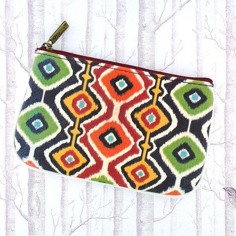 Mlavi Ikat pattern print small pouch/coin purse made with Eco-friendly & cruelty free vegan materials. Great for everyday use & wonderful as a gift to family & friends. Wholesale at www.mlavi.com for gift shops, fashion accessories & clothing boutiques, museum stores worldwide.