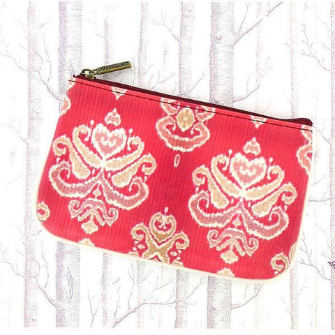 Mlavi Ikat pattern print small pouch/coin purse made with Eco-friendly & cruelty free vegan materials. Great for everyday use & wonderful as a gift to family & friends. Wholesale at www.mlavi.com for gift shops, fashion accessories & clothing boutiques, museum stores worldwide.