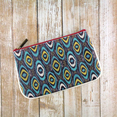 Mlavi Ikat pattern print small pouch/coin purse made with Eco-friendly & cruelty free vegan materials. Great for everyday use & wonderful as a gift to family & friends. Wholesale at www.mlavi.com