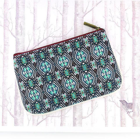 Mlavi Ikat pattern print small pouch/coin purse made with Eco-friendly & cruelty free vegan materials. Great for everyday use & wonderful as a gift to family & friends. Wholesale at www.mlavi.com