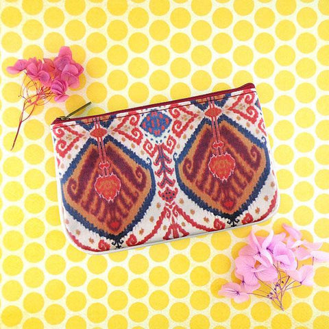 Mlavi Ikat pattern print small pouch/coin purse made with Eco-friendly & cruelty free vegan materials. Great for everyday use & wonderful as a gift to family & friends. Wholesale at www.mlavi.com