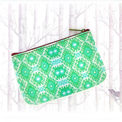 Mlavi Ikat pattern print small pouch/coin purse made with Eco-friendly & cruelty free vegan materials. Great for everyday use & wonderful as a gift to family & friends. Wholesale at www.mlavi.com