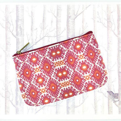 Mlavi Ikat pattern print small pouch/coin purse made with Eco-friendly & cruelty free vegan materials. Great for everyday use & wonderful as a gift to family & friends. Wholesale at www.mlavi.com