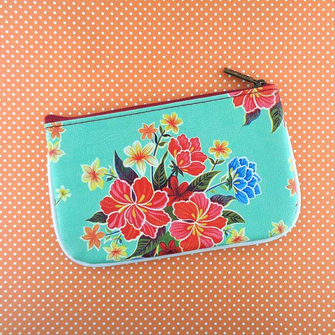 Mlavi Eco-friendly, cruelty-free, ethically made vegan/faux leather small pouch/coin purse features colorful Mexican oilcloth hibiscus flower pattern. Great for every use or as gift for family & friends. Wholesale at www.mlavi.com for gift shops, clothing & fashion accessories boutiques worldwide.