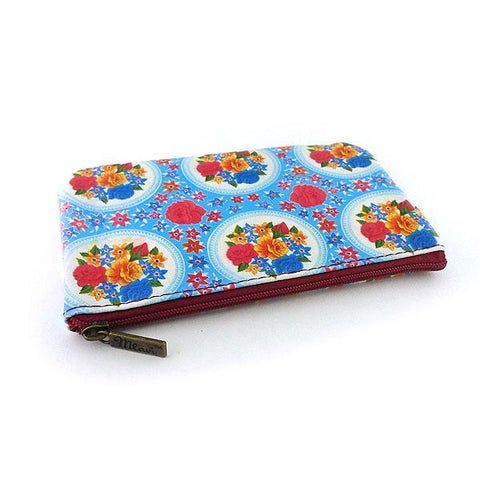 Mlavi Eco-friendly, cruelty-free, ethically made vegan/faux leather small pouch/coin purse features colorful Mexican oilcloth garden flora pattern. Great for every use or as gift for family & friends. Wholesale at www.mlavi.com for gift shops, clothing & fashion accessories boutiques worldwide.