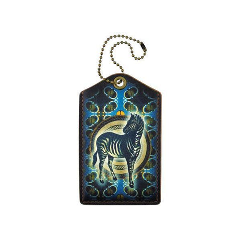 Mlavi vegan leather vintage style luggage tag features Zebra illustration on the African textile pattern background. A great gift idea for yourself & your friends & family. More whimsical animal themed fashion accessories are available for wholesale at www.mlavi.com for gift & boutique buyer.