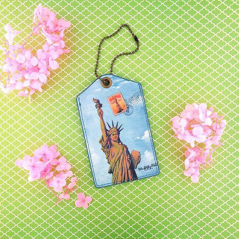 Eco-friendly, cruelty-free, ethically made New York Statue of Liberty print vegan luggage tag by Mlavi Studio. Great for travel or as gift for family & friends. Wholesale at www.mlavi.com to gift shop, clothing & fashion accessories boutiques, book stores.