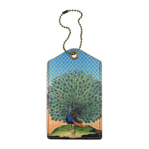 Mlavi's vegan leather vintage style luggage tag features whimsical peacock illustration. A great gift idea for yourself & your friends & family. More whimsical fashion accessories are available for wholesale at www.mlavi.com for gift shop,  , fashion accessories & clothing boutique buyers in Canada, USA & worldwide.