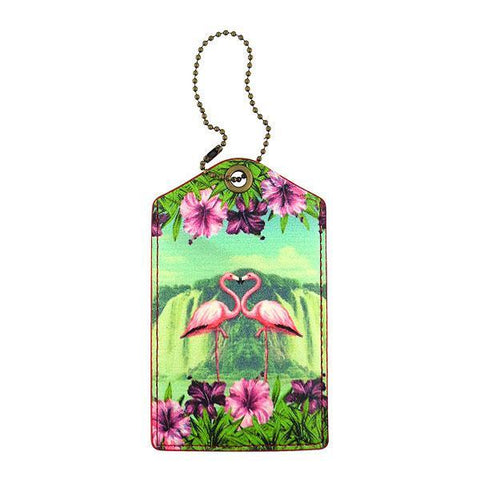 Mlavi vegan leather vintage style luggage tag features whimsical flamingo & hibiscus flower illustration. A great gift idea for yourself & your friends & family. More whimsical fashion accessories are available for wholesale at www.mlavi.com for gift shop,  , fashion accessories & clothing boutique buyers in Canada, USA & worldwide.
