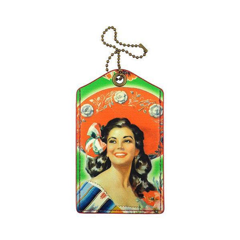 Mlavi studio retro style Mexican calendar pinup girl print vegan luggage tag made with Eco-friendly & cruelty free vegan materials. Wholesale at www.mlavi.com to gift shops, clothing boutique & fashion accessories boutiques, book stores, souvenir shops in Canada, USA & worldwide.