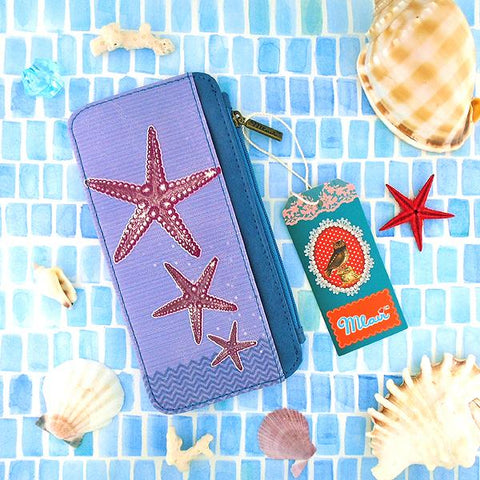 Eco-friendly, cruelty-free, ethically made starfish print vegan cardholder by Mlavi Studio. Great for travel or as gift for family & friends. Wholesale at www.mlavi.com to gift shop, clothing & fashion accessories boutiques, book stores.