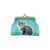 for Eco-friendly, cruelty-free, ethically made vegan/faux leather kiss lock frame coin purse with cute blue eyed kitten on aqua polka dot background printt by Mlavi Studio. Wholesale available at www.mlavi.com along with other whimsical fashion accessories for gift shops & boutiques worldwide.