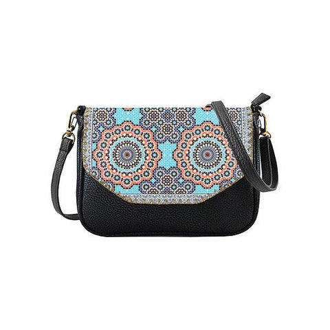 Mlavi Studio's whimsical vegan cross body bag/clutch with Bohemian style Moroccan pattern print. It's roomy enough to hold wallet, smart phone and small personal items like key and lip balm. Wholesale at www.mlavi.com for gift shops, fashion accessories & clothing boutiques, museum stores worldwide.