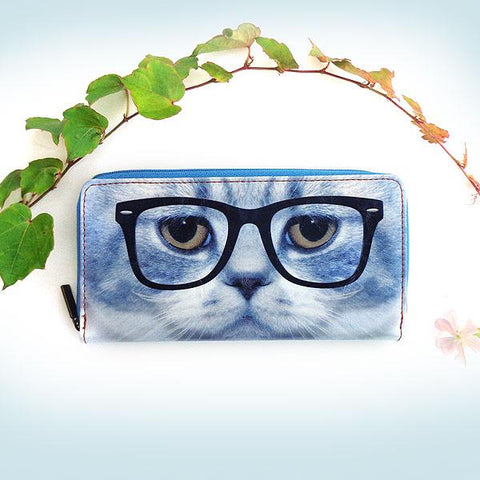 Eco-friendly, cruelty-free, ethically made vegan/faux leather large zipper wallet with cute big blue eye cat print by Mlavi Studio. It can carry smart phone & passport. Wholesale at www.mlavi.com for gift shops, fashion accessories & clothing boutiques in Canada, USA & worldwide.