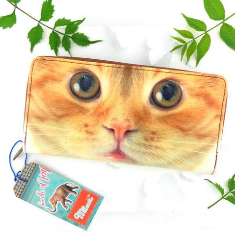 Eco-friendly, cruelty-free, ethically made vegan/faux leather large zipper wallet with cute big blue eye cat print by Mlavi Studio. It can carry smart phone & passport. Wholesale at www.mlavi.com for gift shops, fashion accessories & clothing boutiques in Canada, USA & worldwide.