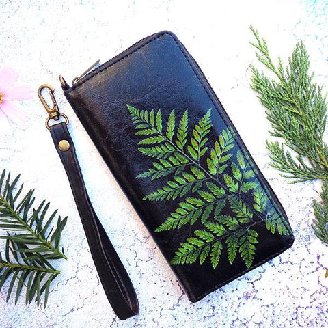 Mlavi studio's Fern leaf printed vegan large wristlet wallet made with Eco-friendly & cruelty free vegan materials. Gift & boutique buyer can order wholesale at www.mlavi.com for ethically made & unique fashion accessories including bags, wallets, purses, coin purses, travel accessories & gifts.