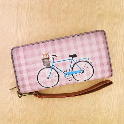 Eco-friendly, cruelty-free, ethically made fun retro look cat on bicycle print large wristlet wallet by Mlavi Studio for everyday use, travel or as whimsical gift for family & friends. Wholesale at www.mlavi.com