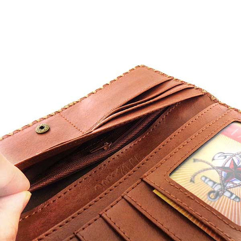 Mlavi large vegan flat wallet with whimsical & exotic Ikat pattern print & framed with decorative stitches around the edge made with cruelty-free Eco-friendly faux/vegan materials. This bohemian chic vegan wallet is fun & functional for everyday use or as gift for your family & friends who appreciate fashion accessories that makes bold statement especially for those who embrace vegan life style. 
