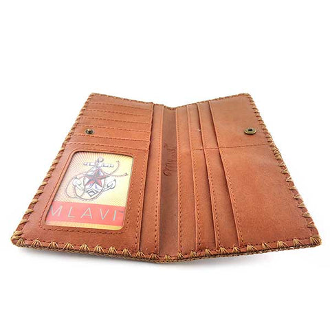 Mlavi large vegan flat wallet with whimsical & exotic Ikat pattern print & framed with decorative stitches around the edge made with cruelty-free Eco-friendly faux/vegan materials. This bohemian chic vegan wallet is fun & functional for everyday use or as gift for your family & friends who appreciate fashion accessories that makes bold statement especially for those who embrace vegan life style. 