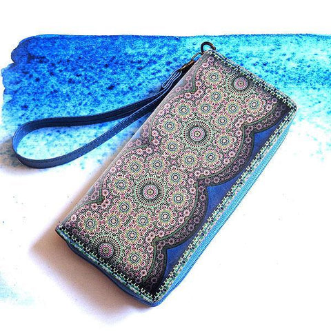 Mlavi Moroccan pattern print vegan large wristlet wallet made with Eco-friendly vegan materials. Great for everyday use, travel & as a gift for family & friends. Wholesale at www.mlavi.com gift shops, fashion accessories & clothing boutiques, book stores in Canada, USA & worldwide.