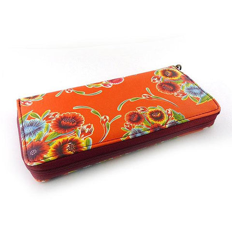 Mexican oilcloth style bloom flower print orange vegan wristlet wallet for every use, travel or as gift for family & friends. Wholesale at www.mlavi.com