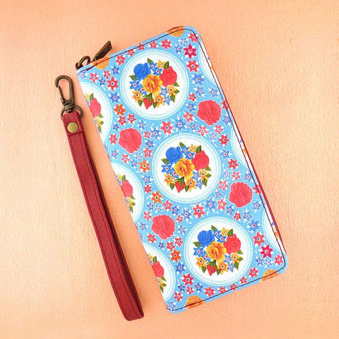 Mlavi Eco-friendly, cruelty-free, ethically made vegan wristlet wallet features colorful Mexican oilcloth garden flower pattern print. Great for every use, travel or as gift for family & friends. Wholesale at www.mlavi.com for gift shops, clothing & fashion accessories boutiques worldwide.