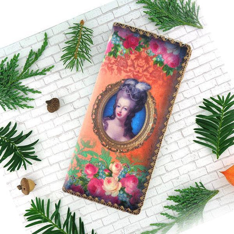 Mlavi vintage style queen Marie Antoinette vegan large flat wallet made with durable, Eco-friendly vegan materials. Great for everyday use, travel or as gift for family & friends. Wholesale at www.mlavi.com to gift shop, clothing & fashion accessories boutiques, book stores in Canada, USA & worldwide.