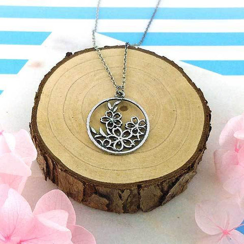 Shop LAVISHY handmade cutout Cherry Blossom Flower pendant necklace made with recycled materials. They are unique, fun, Eco-friendly & affordable. Wholesale available at www.lavishy.com for gift shop, boutique & corporate buyer.