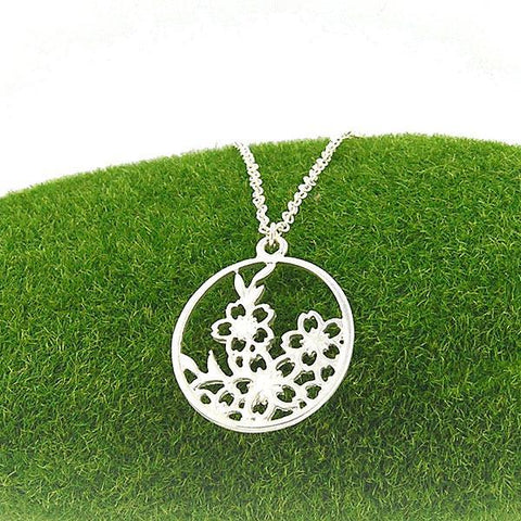 Shop LAVISHY handmade cutout Cherry Blossom Flower pendant necklace made with recycled materials. They are unique, fun, Eco-friendly & affordable. Wholesale available at www.lavishy.com for gift shop, boutique & corporate buyer.
