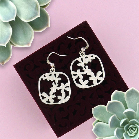 Online shopping for LAVISHY silver plated cutout cherry blossom flower pendant earrings- a symbol of beauty. Wholesale available at www.lavishy.com to gift shops, fashion accessories and clothing boutiques in Canada, USA and worldwide.