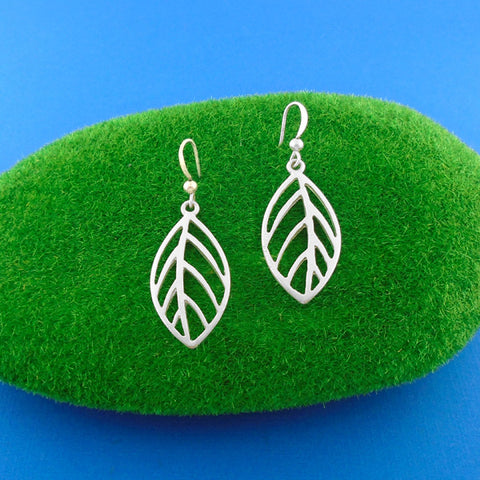 Online shopping for LAVISHY silver plated cutout leaf pendant earrings. Wholesale available at www.lavishy.com to gift shops, fashion accessories and clothing boutiques in Canada, USA and worldwide.