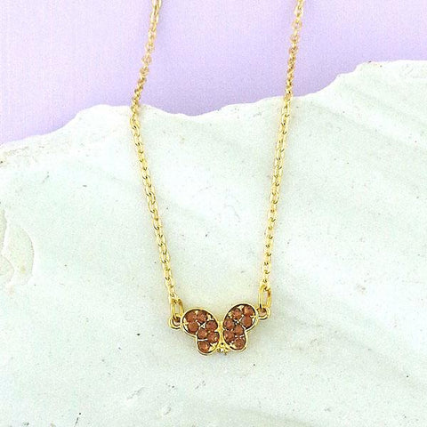 Online shopping for rhodium/12k gold plated butterfly pendant necklace with Austrian crystal accent. A great gift for you or your girlfriend, wife, co-worker, friend & family. Wholesale at www.lavishy.com with many unique & fun fashion accessories.