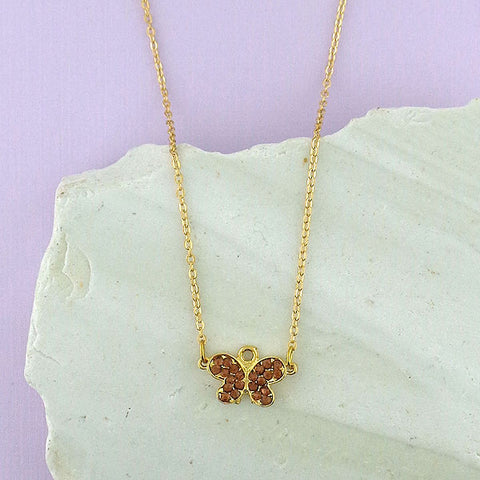 Online shopping for rhodium/12k gold plated butterfly pendant necklace with Austrian crystal accent. A great gift for you or your girlfriend, wife, co-worker, friend & family. Wholesale available at www.lavishy.com with many unique & fun fashion accessories.