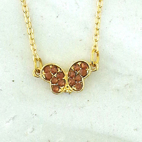 Online shopping for rhodium/12k gold plated butterfly pendant necklace with Austrian crystal accent. A great gift for you or your girlfriend, wife, co-worker, friend & family. Wholesale at www.lavishy.com with many unique & fun fashion accessories.