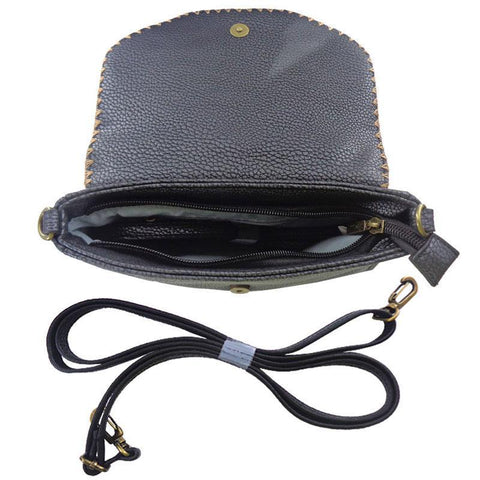 Mlavi Studio's whimsical vegan cross body bag/clutch with Bohemian style Moroccan pattern print. It's roomy enough to hold wallet, smart phone and small personal items like key and lip balm. Wholesale at www.mlavi.com for gift shops, fashion accessories & clothing boutiques, museum stores worldwide.