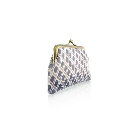 Eco-friendly, cruelty-free, ethically made vegan kiss lock frame coin purse with vintage style zebra print by Mlavi Studio. It's great for everyday use or as gift for animal loving family and friends. Wholesale at www.mlavi.com to gift shop, clothing & fashion accessories boutiques, book stores.